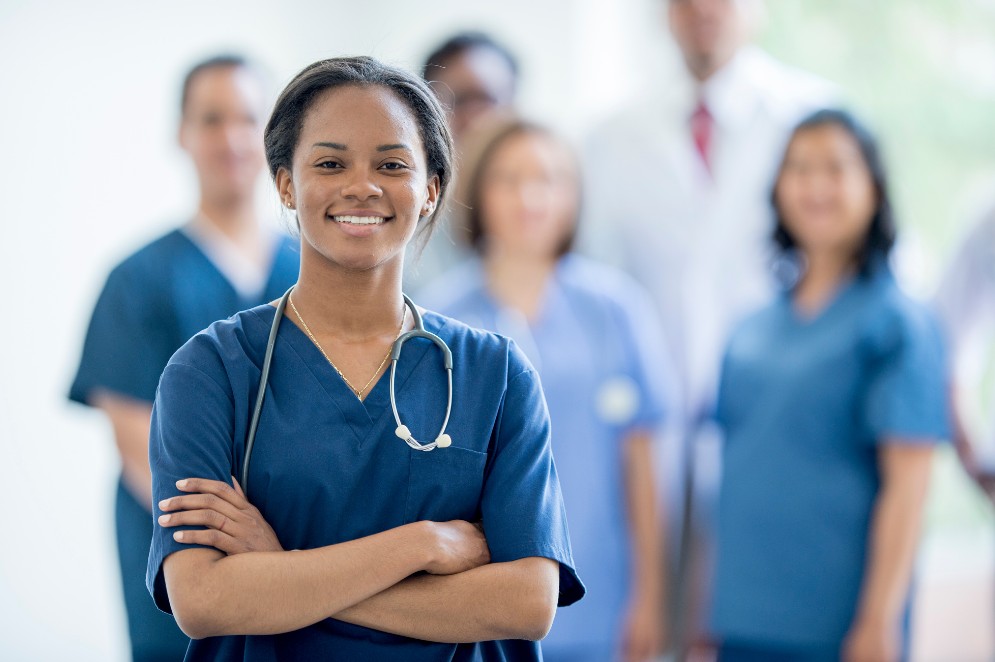 Professional home care nurse with medical team providing trusted in-home care support for Indianapolis families